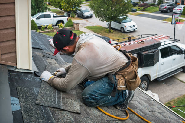 Professional Metal Roofing technician working in Lochmere, NH